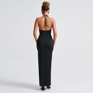 Detail of the backless halter design on this elegant black slit dress for women
