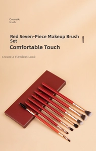 Detailed set of 7 professional eye makeup brushes with matte red handles and storage box