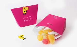 Detail of rose red candy gift box with fruit sweets and You're the Best text