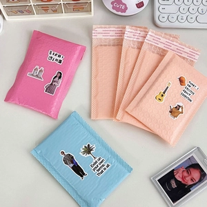 Thickened bubble envelope mailers in pink, orange, and blue with protective adhesive strips
