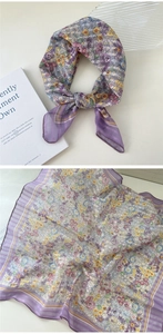 Detailed view of lilac floral cotton linen scarf with delicate purple overlock stitching