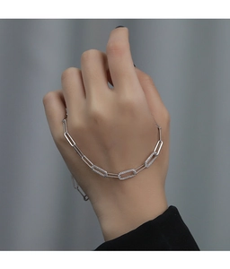 Detail of 925 sterling silver chunky chain bracelet with sparkling pavé cubic zirconia