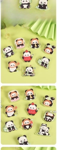 Close-up of transparent acrylic panda brooches with artistic Chinese characters
