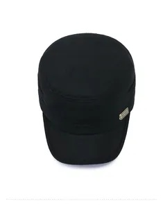 Top down view of black wool flat top cadet cap featuring a golden rectangular metal logo