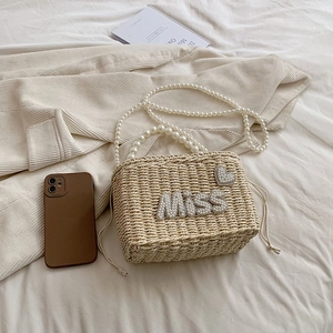 Summer woven beach bag with pearl handle, MISS lettering and heart pearl decorations