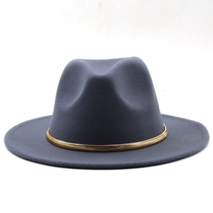 Detail of dark grey fedora wool hat featuring stylish gold snake chain band accessory