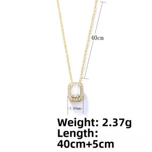 Macro view of 18K gold necklace pendant with emerald cut zircon and 7.95mm width