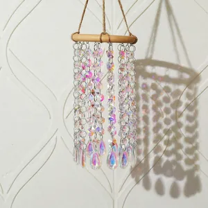 Rainbow crystal suncatcher with wood ring and AB beads casting colorful light reflections