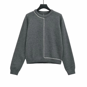 Grey crewneck knit sweater with white contrast stitch lines and ribbed trim details
