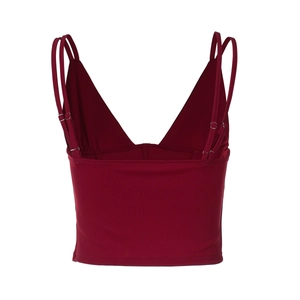 Detail of deep red backless camisole featuring double thin straps and elastic waist stitching