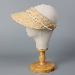 Women's straw top hat with elegant pearls and rhinestone accents for sun protection