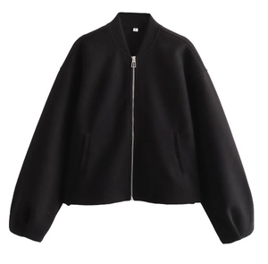 Close-up of a black bomber jacket with silver metal zipper and size S neck label