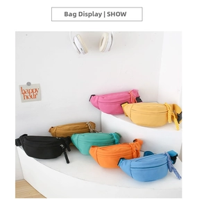 Detailed display of colorful nylon kids waist bags stacked on geometric stairs