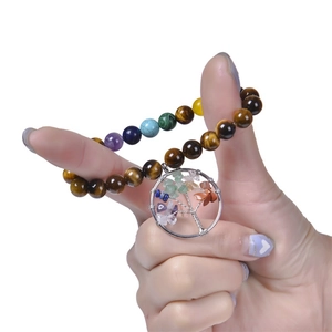 Colorful natural stone beaded bracelet with Tiger Eye and Tree of Life charm on wrist