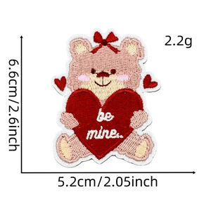 Detail of pink embroidered bear patch with red heart and be mine text, 6.6cm height
