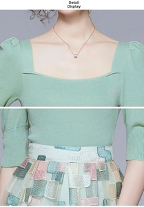 Detail view of square collar knit top and mesh skirt with 3D embroidery accents
