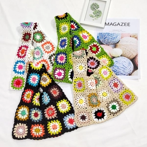 Handmade granny square crochet tote bags in white, green, black, and beige colors