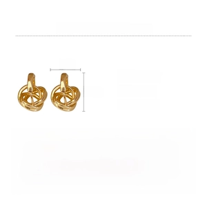 Detailed view of minimalist gold twisted knot earrings showing 1.4x1cm size and 4.9g weight