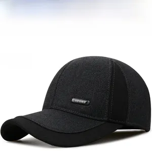 Detail of grey wool blend baseball cap with black accents and metallic Sport label