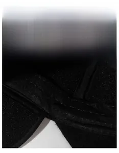 Detailed view of the wide black moisture-wicking sweatband with durable stitching