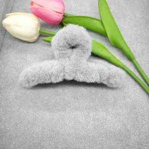 Close-up of 11cm large grey plush hair claw clip with soft faux fur texture and decor