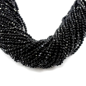 Faceted natural black spinel round beads for DIY jewelry making displayed on white background