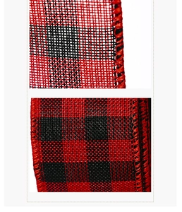 Macro shot of red and black plaid ribbon with fine stitched edges for DIY crafts