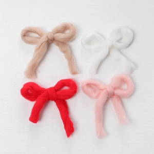 Knitted wool bow Christmas tree ornaments in khaki, white, red, and pink colors