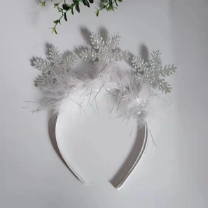 Cute white snowflake headband with fluffy feathers and silver glitter for Christmas party