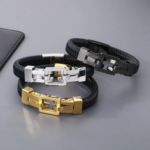 Detailed view of woven leather bracelets with gold, silver, and gun black metal clasps