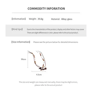 Detailed view of alloy dachshund pendant with glass bead accents on 99cm wax rope necklace