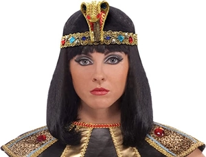 Detail of golden Egyptian cobra headpiece with red and blue gemstone accents for cosplay