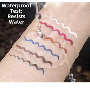 Waterproof test of multi-colored fine liquid eyeliners on skin under flowing water