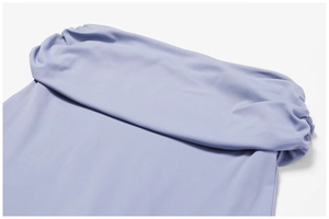 Macro detail of lavender yoga top featuring a sophisticated off-shoulder folded neckline