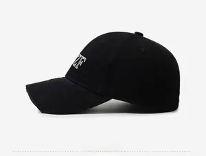 Detailed shot of vintage black cotton baseball cap with ZF embroidery and distressed brim