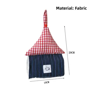 Macro detail of house-shaped fabric tissue holder showing cat patch and dimensions