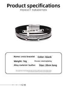Macro shot of layered black leather bracelet with blessed engraving and metal cross charm
