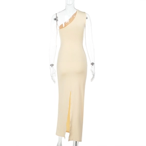 Detail of the high-slit back hem and slim fit cut of this cream one-shoulder evening dress
