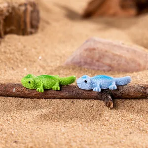 Realistic miniature lizard figures in green and blue colors for fairy garden decoration