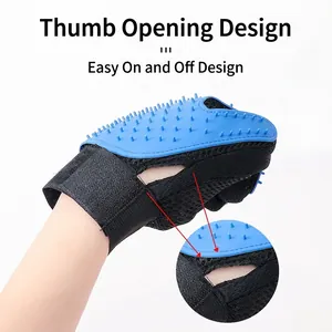 Blue silicone pet grooming glove for massage and bathing with thumb opening design