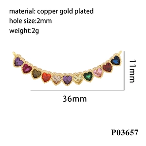 Macro detail of 18K gold plated heart zirconia connector with 36mm x 11mm dimensions