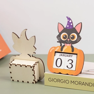 Front and back detail of wooden Halloween countdown calendar with pumpkin and black cat