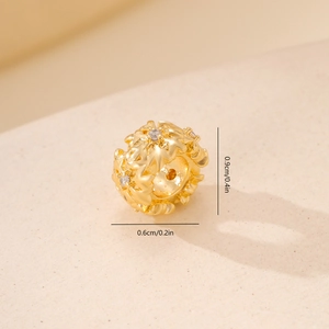 Detail view of a 0.9cm gold cubic zirconia flower bead with precise dimensions