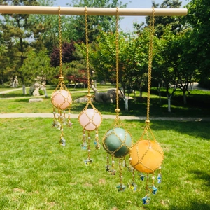 Unique mesh crystal ball net pendant holders with star tassels and assorted stones
