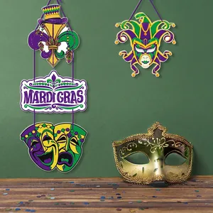 Mardi Gras decoration set featuring purple green gold hanging ornaments and a masquerade mask
