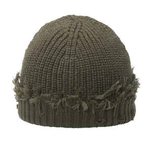 Detailed close-up of dark olive green distressed knitted beanie with frayed edge details