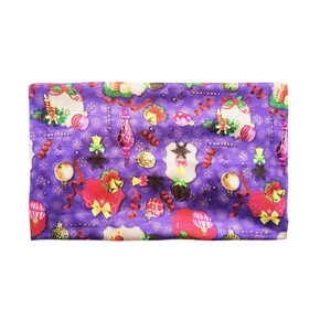 Elastic purple Christmas headband with festive ornaments and holly for yoga and sports