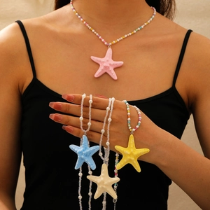 Bohemian seashell and starfish necklace set featuring colorful beads and faux pearls