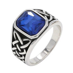 Vintage mens silver ring with a large blue gemstone and Celtic knot patterns