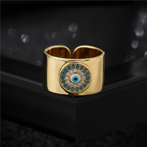 18K gold plated wide open ring featuring a blue zircon evil eye centerpiece
